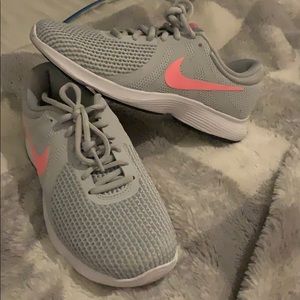 Grey Nike running shoes